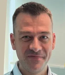 Professional headshot of Caucasian male client