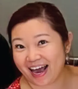 Asian woman smiling cheerfully