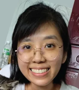Asian female client wearing glasses portrait